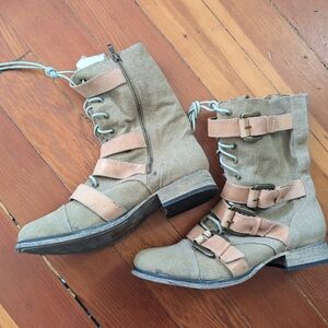 Tan canvas boots with side zip and leather buckles